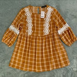 Brand new-Never worn!! Long Sleeve Boutique Top; Size Small; Original price: $66